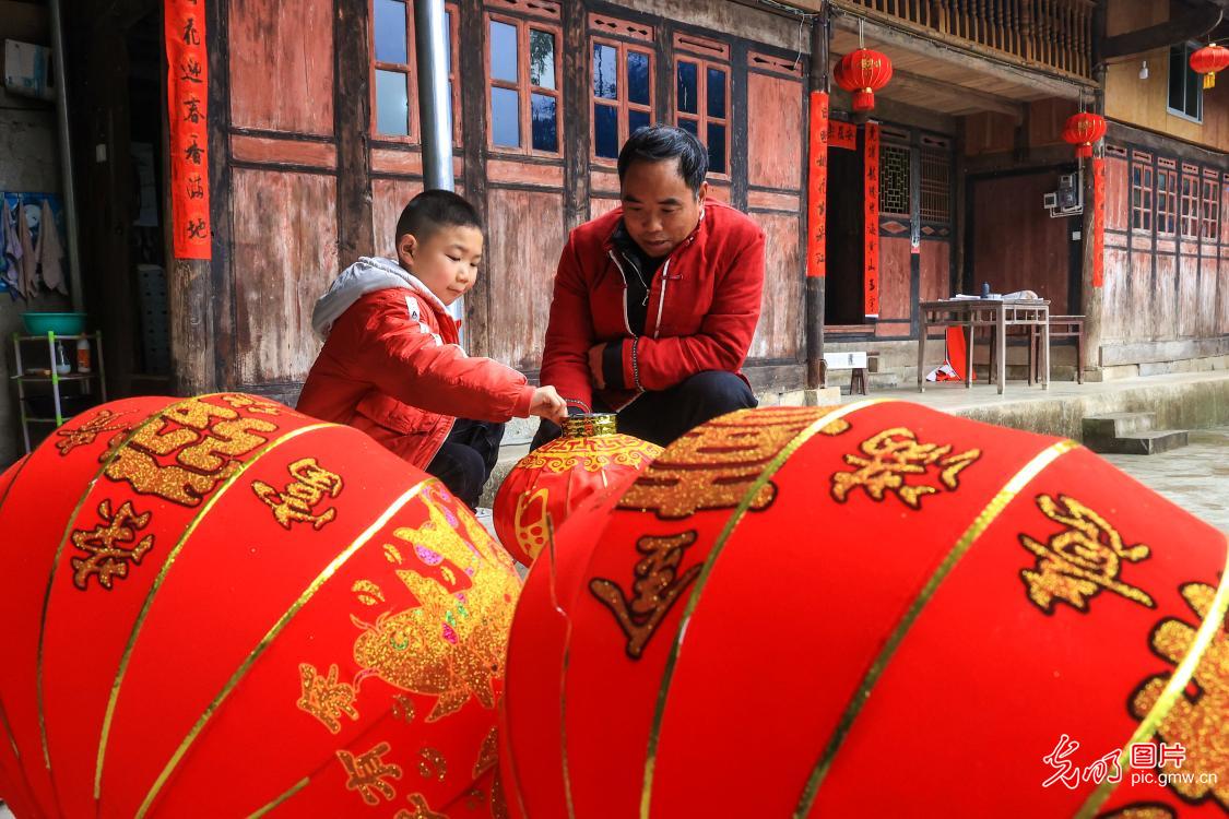 Local family in a traditional village celebrating Lunar New Year
